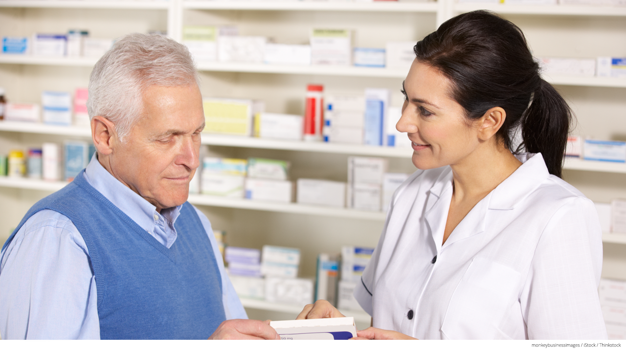 Senior man filling prescription