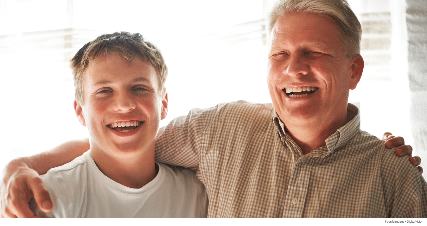 Portrait of father with teenage son