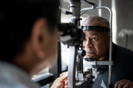 Vision and glaucoma testing on older African American man